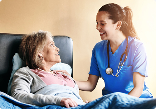 Hospice nurse explaining Medicare hospice coverage to the patient